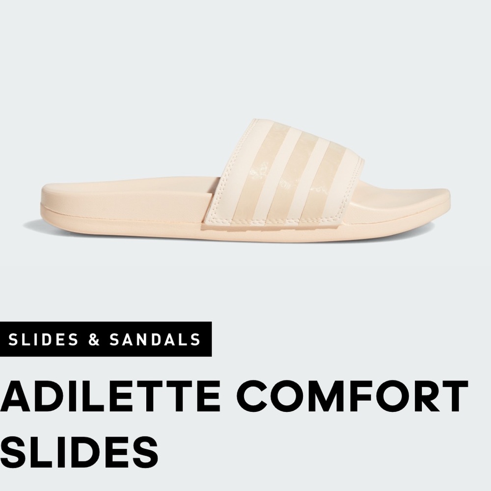 Woman’s pink/peach adidas slides